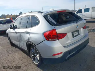 2014 BMW X1 sDrive28i with VIN WBAVM1C58EVW52847, listed as a IAAI auction lot 40779553 with 151,076 mi miles. Bid and sale history available at carsss.com. Image 3.