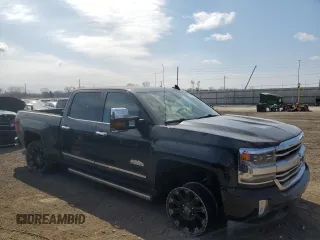 2016 Chevrolet Silverado 1500 High Country with VIN 3GCUKTEC5GG208414, listed as a Copart auction lot 50716275 with 88,319 mi miles and Salvage Title. Bid and sale history available at DreamBid. Image 4.