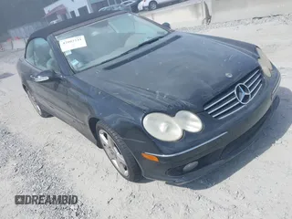 2005 Mercedes-Benz CLK 500 with VIN WDBTK75J55F123703, listed as a IAAI auction lot 42802541 with 139,421 mi miles and . Bid and sale history available at DreamBid. Image 1.