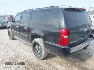 2011 Chevrolet Suburban LTZ with VIN 1GNSKKE39BR303754, listed as a IAAI auction lot 42070374 with 207,824 mi miles and . Bid and sale history available at DreamBid. Image 3.