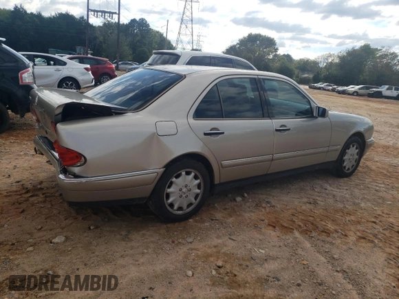 1999 Mercedes-Benz E-Class with VIN WDBJF65HXXA891437, listed as a Copart auction lot 73278334 with 197,159 mi miles and Salvage Title. Bid and sale history available at carsss.com. Image 3.