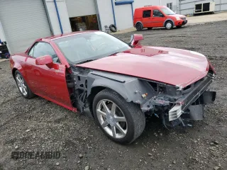 2004 Cadillac XLR z VIN 1G6YV34A845603928, wystawiony jako Copart lot #79260073 z przebiegiem 51 336 mil mil oraz Szkody całkowita. Historia ofert i sprzedaży dostępna na DreamBid. Obrazek 4.