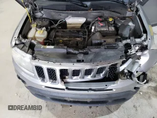 2016 Jeep Compass Sport with VIN 1C4NJCBA1GD512864, listed as a Copart auction lot 56297115 with 216,693 mi miles and Salvage title. Bid and sale history available at DreamBid. Image 12.