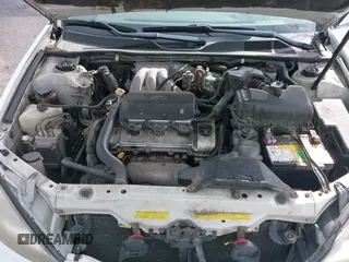 2002 Toyota Camry XLE z VIN 4T1BF30KX2U035422, wystawiony jako IAAI lot #41762363 z przebiegiem 220 465 mil mil oraz . Historia ofert i sprzedaży dostępna na DreamBid. Obrazek 10.