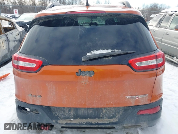 2015 Jeep Cherokee Trailhawk with VIN 1C4PJMBS9FW655233, listed as a IAAI auction lot 41430715 with 138,181 mi miles and . Bid and sale history available at carsss.com. Image 17.