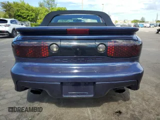 1999 Pontiac Firebird Trans Am with VIN 2G2FV32GXX2229175, listed as a Copart auction lot 65678225 with 180,298 mi miles and Salvage title. Bid and sale history available at DreamBid. Image 6.
