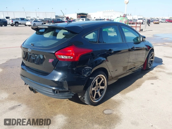 2018 Ford Focus ST with VIN 1FADP3L95JL332577, listed as a IAAI auction lot 41748222 with 73,491 mi miles and . Bid and sale history available at DreamBid. Image 4.
