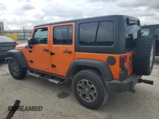 2013 Jeep Wrangler Unlimited Rubicon with VIN 1C4BJWFGXDL545866, listed as a Copart auction lot 59788115 with 102,617 mi miles and Salvage title. Bid and sale history available at DreamBid. Image 2.