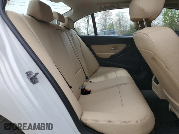 2017 BMW 3 Series 320i xDrive with VIN WBA8E5G5XHNU22436, listed as a Copart auction lot 52702805 with 74,008 mi miles and Salvage title. Bid and sale history available at DreamBid. Image 10.