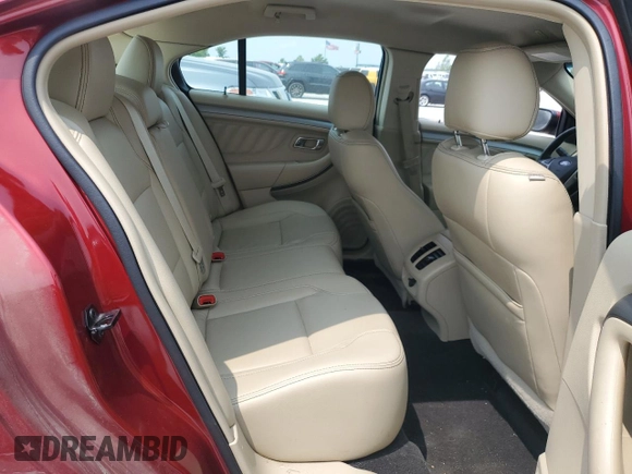 2015 Ford Taurus SEL z VIN 1FAHP2E88FG112446, wystawiony jako Copart lot #58920715 z przebiegiem 65 392 mil mil oraz Czysty tytuł • Clean title. Historia ofert i sprzedaży dostępna na DreamBid. Obrazek 10.
