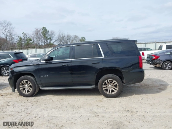 2016 Chevrolet Tahoe LT with VIN 1GNSCBKCXGR100381, listed as a IAAI auction lot 41542315 with 228,506 mi miles. Bid and sale history available at carsss.com. Image 14.