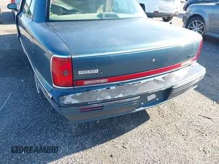 1995 Oldsmobile 98 Regency Elite Series I - 1SB z VIN 1G3CX52K4S4314539, wystawiony jako IAAI lot #42377503 z przebiegiem 125 856 mil mil oraz . Historia ofert i sprzedaży dostępna na DreamBid. Obrazek 6.