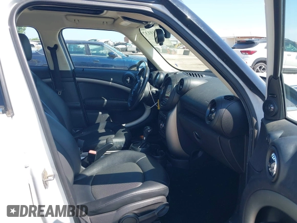 2015 MINI Countryman with VIN WMWZB3C55FWR43773, listed as a IAAI auction lot 42510137 with 150,764 mi miles and . Bid and sale history available at DreamBid. Image 5.