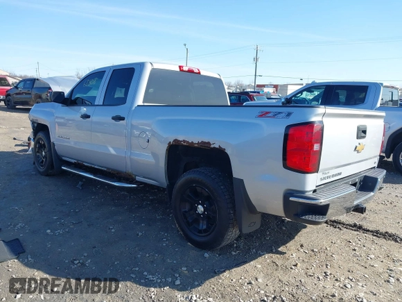 2014 Chevrolet Silverado 1500 LT with VIN 1GCVKREC0EZ151088, listed as a IAAI auction lot 41763808 with 124,668 mi miles and . Bid and sale history available at DreamBid. Image 3.