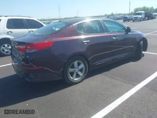 2014 Kia Optima LX with VIN 5XXGM4A77EG310738, listed as a IAAI auction lot 41990314 with 1 mi miles. Bid and sale history available at carsss.com. Image 4.