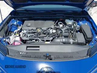 2025 Toyota Camry LE with VIN 4T1DAACK3SU104152, listed as a IAAI auction lot 42039337 with 1,423 mi miles and . Bid and sale history available at DreamBid. Image 10.