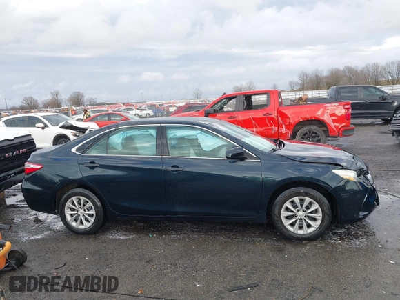 2015 Toyota Camry XLE with VIN 4T1BF1FK4FU043212, listed as a IAAI auction lot 41706573 with 170,074 mi miles and . Bid and sale history available at DreamBid. Image 13.