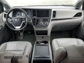 2015 Toyota Sienna XLE with VIN 5TDYK3DC6FS660035, listed as a Copart auction lot 51660075 with 176,968 mi miles and Salvage Title. Bid and sale history available at DreamBid. Image 8.