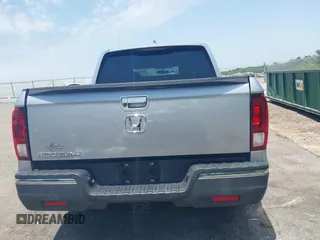 2018 Honda Ridgeline RTL z VIN 5FPYK2F5XJB001064, wystawiony jako IAAI lot #42252956 z przebiegiem 95 272 mil mil oraz . Historia ofert i sprzedaży dostępna na DreamBid. Obrazek 17.