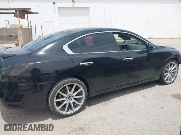 2012 Nissan Maxima S with VIN 1N4AA5AP1CC819585, listed as a IAAI auction lot 42244364 with 180,488 mi miles and . Bid and sale history available at DreamBid. Image 14.