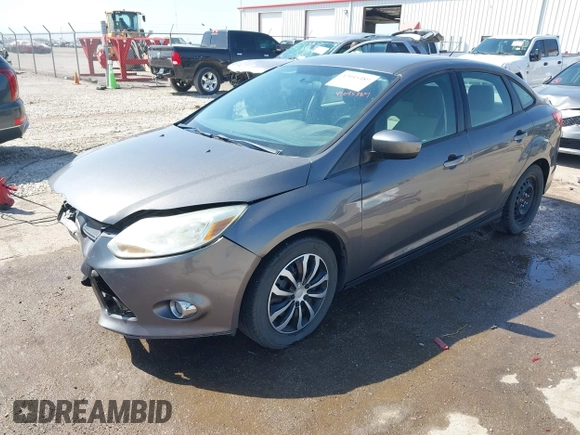 2012 Ford Focus SE с VIN 1FAHP3F20CL456565, выставлен на аукционе IAAI как лот 42045389 с пробегом 164 323 миль миль и . История ставок и продаж доступна на DreamBid. Изображение 2.