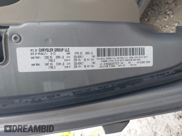 2013 Dodge Grand Caravan SE with VIN 2C4RDGBG2DR773577, listed as a IAAI auction lot 41823951 with 226,498 mi miles and . Bid and sale history available at DreamBid. Image 9.