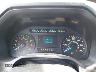 2015 Ford F-150 XL with VIN 1FTMF1C82FKD85016, listed as a IAAI auction lot 42019197 with 63,986 mi miles and . Bid and sale history available at DreamBid. Image 7.