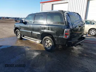 2003 Cadillac Escalade z VIN 1GYEK63N63R196238, wystawiony jako IAAI lot #41426210 z przebiegiem 296 853 mil mil oraz . Historia ofert i sprzedaży dostępna na DreamBid. Obrazek 3.