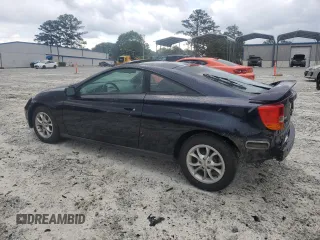 2000 Toyota Celica GT z VIN JTDDR32T1Y0037067, wystawiony jako Copart lot #55262244 z przebiegiem 272 092 mil mil oraz Szkoda całkowita • Salvage title. Historia ofert i sprzedaży dostępna na DreamBid. Obrazek 2.