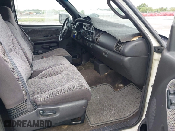 2000 Dodge 2500 z VIN 3B7KC23Z3YG106911, wystawiony jako IAAI lot #42250441 z przebiegiem 162 349 mil mil oraz . Historia ofert i sprzedaży dostępna na DreamBid. Obrazek 5.