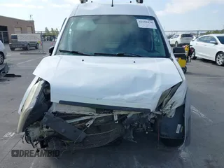 2013 Ford Transit Connect XLT with VIN NM0LS7BN1DT153643, listed as a IAAI auction lot 42658270 with 190,651 mi miles and . Bid and sale history available at DreamBid. Image 13.