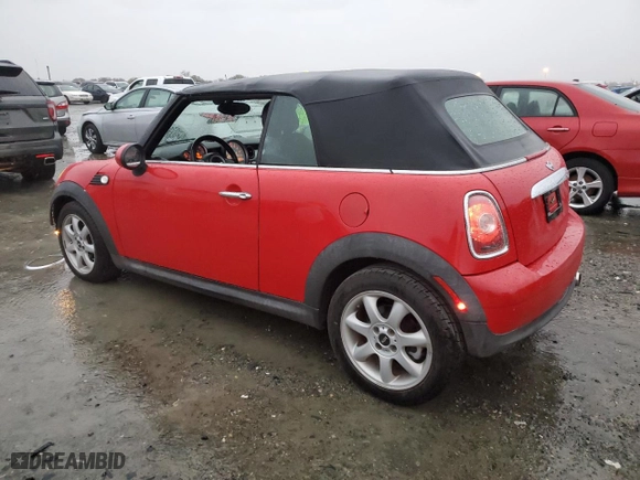2009 MINI Cooper Convertible with VIN WMWMR33539TU96291, listed as a Copart auction lot 83849744 with 65,056 mi miles and Salvage Title. Bid and sale history available at carsss.com. Image 2.