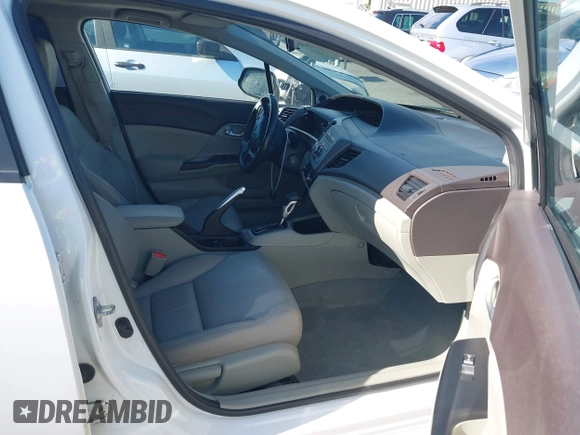2012 Honda Civic EX-L with VIN 19XFB2F92CE381075, listed as a IAAI auction lot 42024543 with 102,703 mi miles and . Bid and sale history available at DreamBid. Image 5.