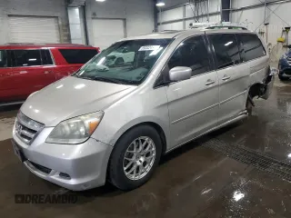 2006 Honda Odyssey EX-L with VIN 5FNRL38706B066771, listed as a Copart auction lot 59332495 with 246,284 mi miles and Salvage title. Bid and sale history available at DreamBid. Image 1.