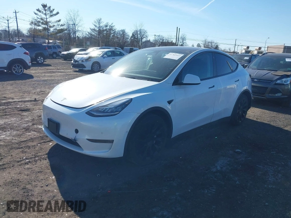 2022 Tesla Model Y Long Range with VIN 7SAYGAEE3NF337220, listed as a IAAI auction lot 41703912 with 46,319 mi miles and . Bid and sale history available at carsss.com. Image 17.