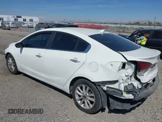 2017 Kia Forte S with VIN 3KPFL4A71HE086412, listed as a IAAI auction lot 42004117 with 201,729 mi miles and . Bid and sale history available at DreamBid. Image 3.