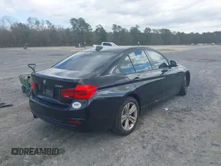 2016 BMW 3 Series 328i with VIN WBA8E9G52GNU30083, listed as a IAAI auction lot 41811439 with 55,396 mi miles. Bid and sale history available at carsss.com. Image 4.