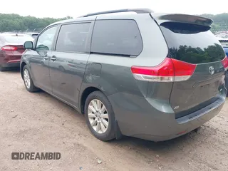 2014 Toyota Sienna Limited with VIN 5TDDK3DC5ES083785, listed as a IAAI auction lot 42559682 with 168,244 mi miles and . Bid and sale history available at DreamBid. Image 3.