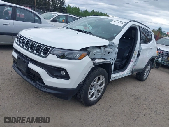 2024 Jeep Compass Latitude with VIN 3C4NJDBN7RT118288, listed as a IAAI auction lot 42130731 with 25,728 mi miles and . Bid and sale history available at carsss.com. Image 2.