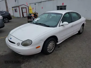 1997 Ford Taurus LX z VIN 1FALP53S0VG291879, wystawiony jako IAAI lot #42498197 z przebiegiem 266 886 mil mil oraz . Historia ofert i sprzedaży dostępna na DreamBid. Obrazek 2.