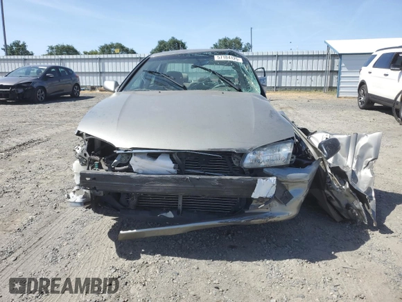 2001 Toyota Camry CE z VIN JT2BG22K410568101, wystawiony jako Copart lot #57184125 z przebiegiem Nie podano mil oraz Szkoda całkowita • Salvage title. Historia ofert i sprzedaży dostępna na DreamBid. Obrazek 5.