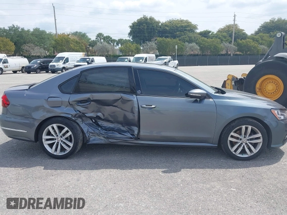 2019 Volkswagen Passat 2.0T Wolfsburg Edition with VIN 1VWLA7A35KC011084, listed as a IAAI auction lot 40385111 with 81,119 mi miles. Bid and sale history available at carsss.com. Image 13.
