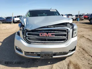 2017 GMC Yukon SLT with VIN 1GKS2BKC9HR345688, listed as a Copart auction lot 52303075 with 122,969 mi miles and Salvage Title. Bid and sale history available at carsss.com. Image 5.