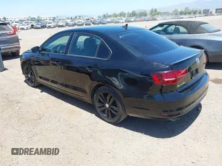2018 Volkswagen Jetta SE Sport with VIN 3VWD17AJ2JM255162, listed as a IAAI auction lot 42506390 with 111,186 mi miles and . Bid and sale history available at DreamBid. Image 3.