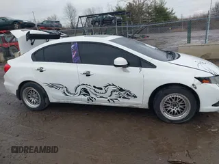 2012 Honda Civic EX-L with VIN 2HGFB2F95CH529693, listed as a IAAI auction lot 41160120 with 194,418 mi miles and . Bid and sale history available at DreamBid. Image 13.