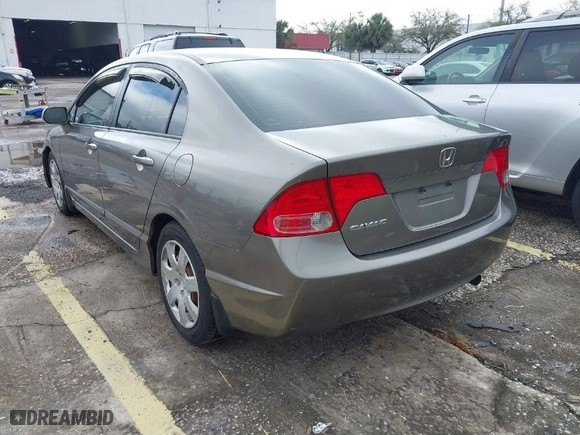 2008 Honda Civic Sdn LX with VIN 1HGFA16528L090232, listed as a IAAI auction lot 41652232 with 148,244 mi miles. Bid and sale history available at carsss.com. Image 3.