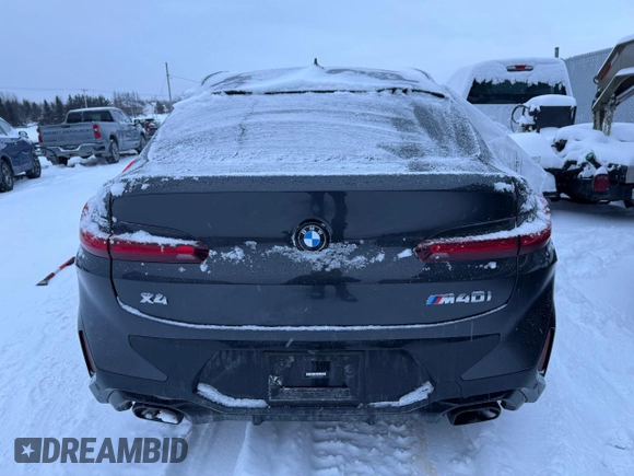 2023 BMW X4 M40i z VIN 5UX43DT03P9S61199, wystawiony jako Copart lot #86424734 z przebiegiem Nie podano mil oraz Szkody całkowita. Historia ofert i sprzedaży dostępna na DreamBid. Obrazek 6.