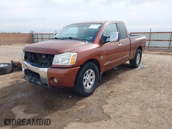 2004 Nissan Titan XE with VIN 1N6AA06A04N508069, listed as a IAAI auction lot 41571931 with 180,119 mi miles. Bid and sale history available at carsss.com. Image 2.