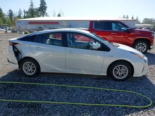 2017 Toyota Prius Two z VIN JTDKARFU1H3033538, wystawiony jako IAAI lot #42362770 z przebiegiem 74 671 mil mil oraz . Historia ofert i sprzedaży dostępna na DreamBid. Obrazek 13.