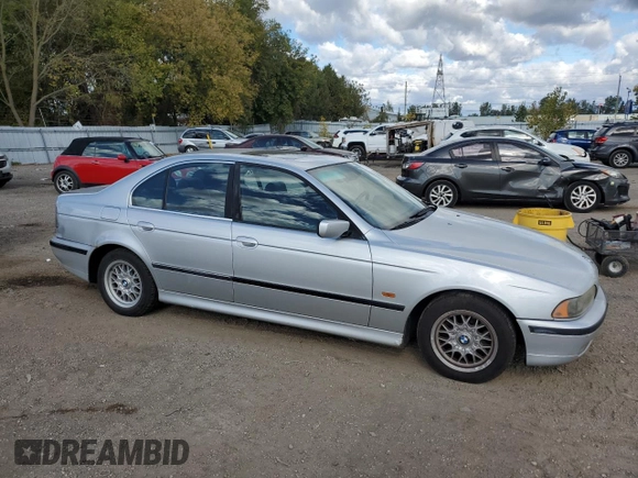 2000 BMW 5 Series 528iA with VIN WBADM6346YGU10549, listed as a Copart auction lot 75047164 with 324,945 mi miles and Salvage Title. Bid and sale history available at carsss.com. Image 4.